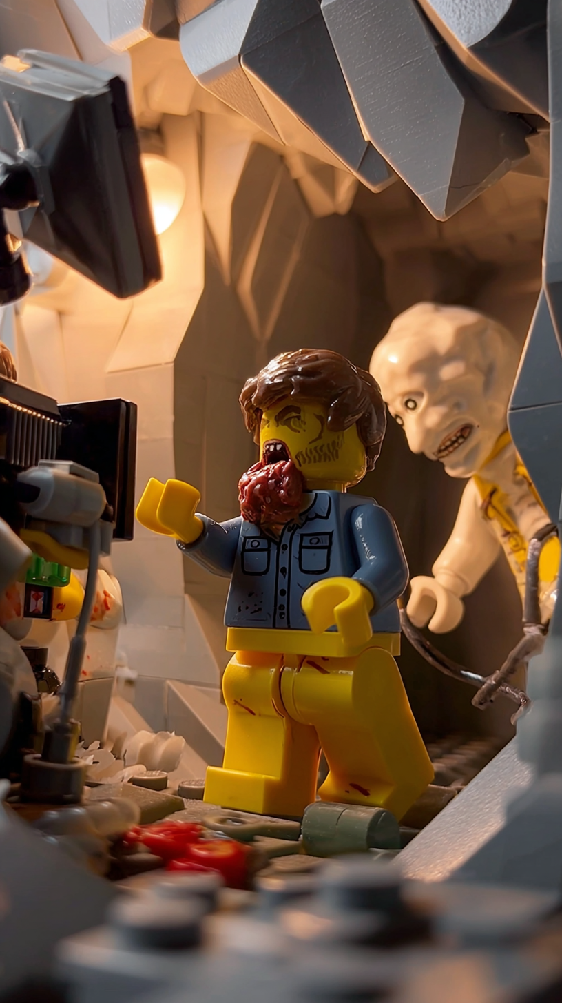 Storyboard 4: Wide shot - LEGO zombie attacking victim in cave setting